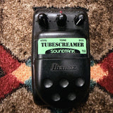 Ibanez Soundtank TS5 Tube Screamer, black: top with the Level, Tone and Dist. knobs, the LED, the green Tubescreamer Soundtank label and the Ibanez pedal