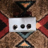 J. Rockett Audio Designs Archer, silver: top end with two 1/4 inch jacks and the power jack between them