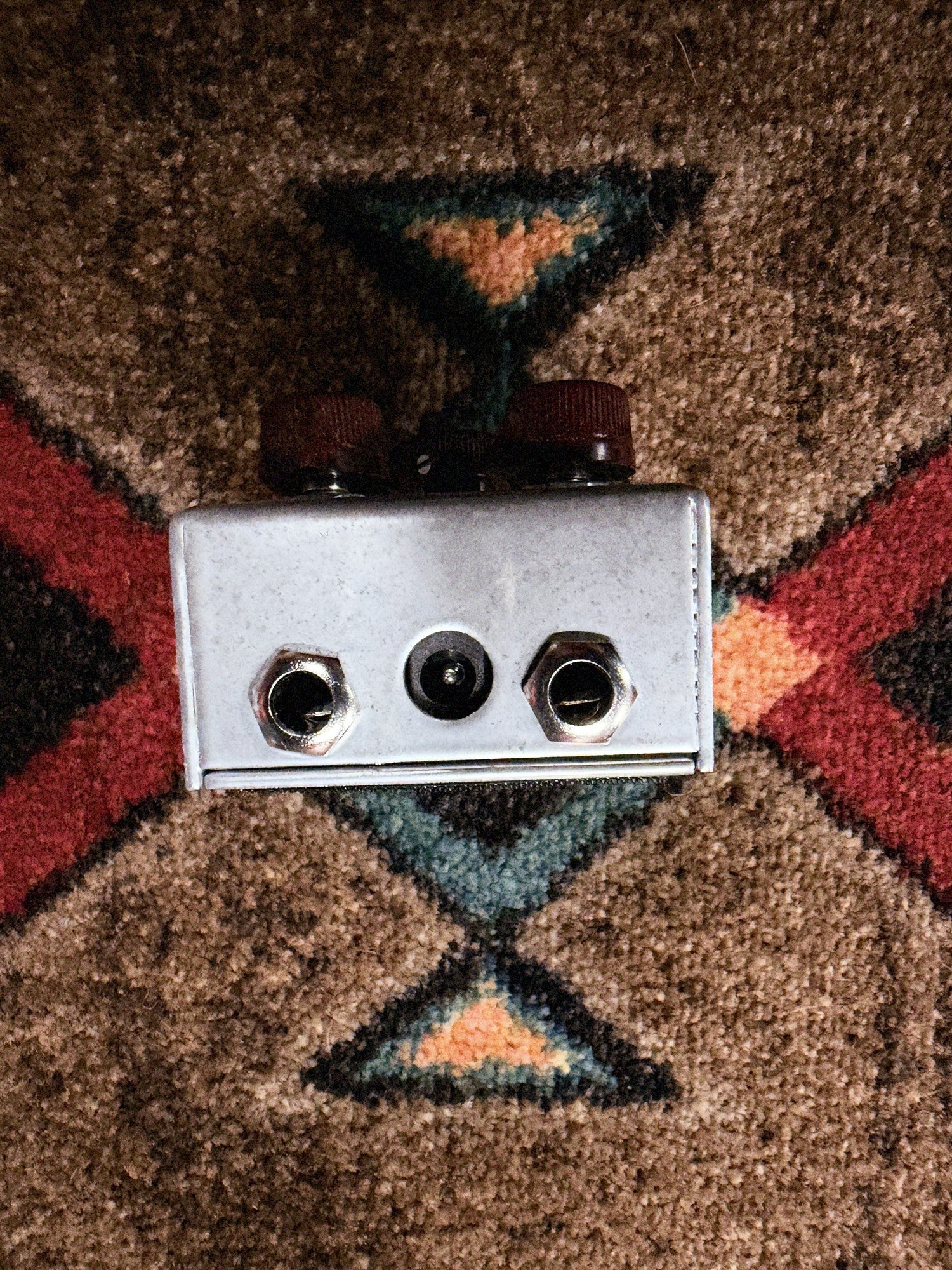 J. Rockett Audio Designs Archer, silver: top end with two 1/4 inch jacks and the power jack between them