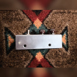 J. Rockett Audio Designs Archer, silver: right side of the enclosure, knob end at the right, a thin curved hairline mark near the middle