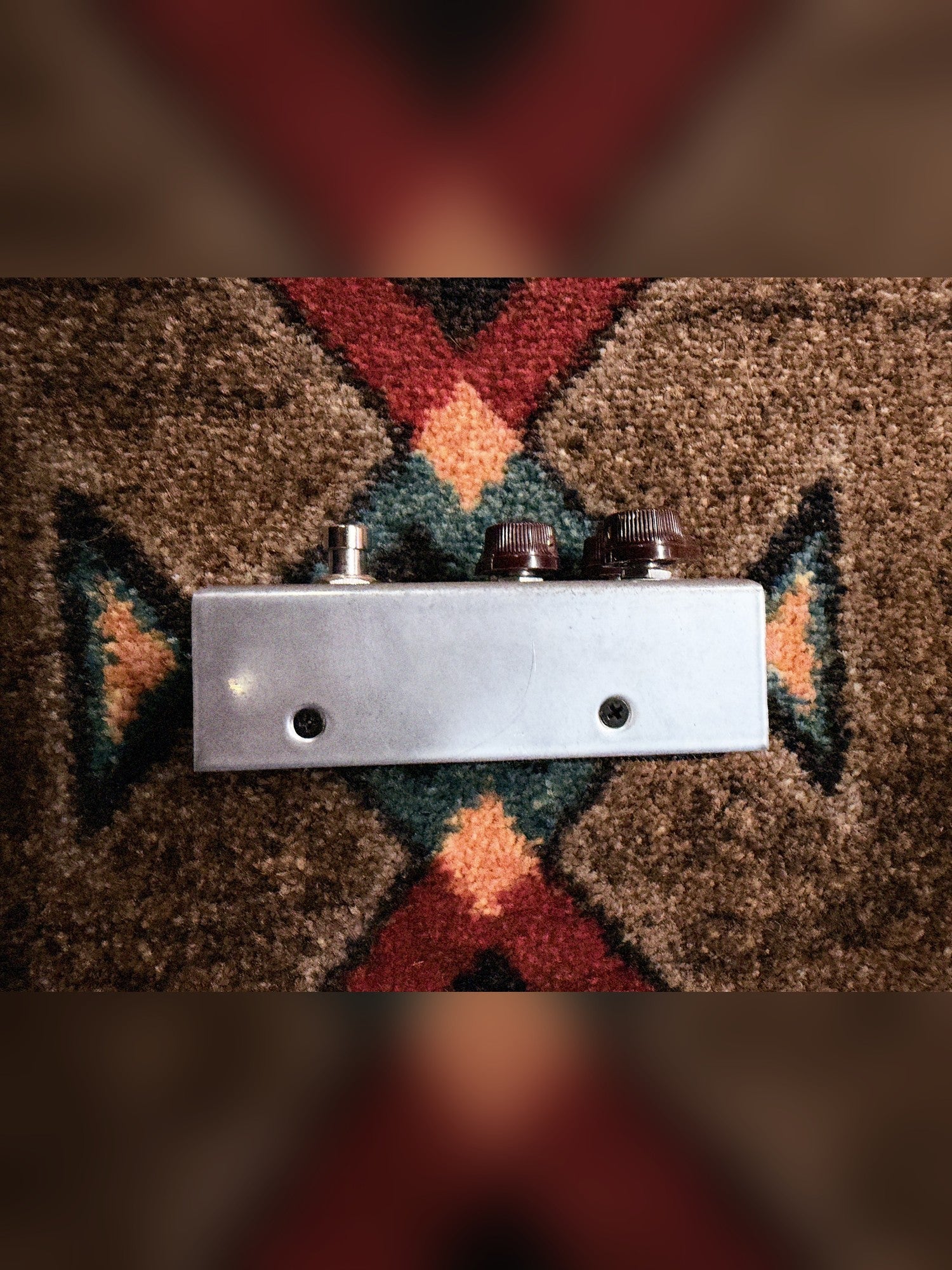 J. Rockett Audio Designs Archer, silver: right side of the enclosure, knob end at the right, a thin curved hairline mark near the middle