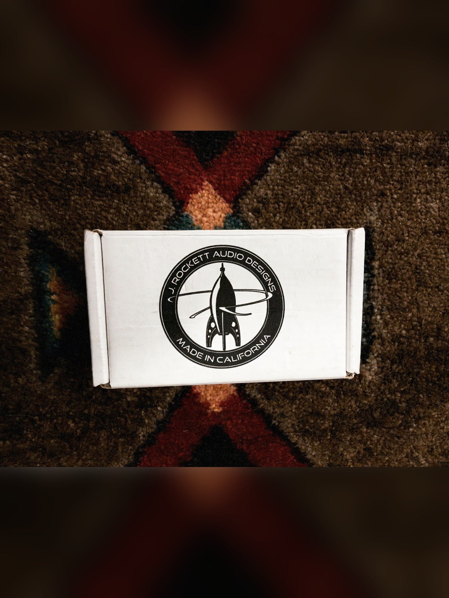 J. Rockett Audio Designs Archer, silver: the white J. Rockett box with the rocket logo and Made in California