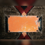 KMD Overdrive, orange: bottom plate with four screws and the paint worn through at the edges