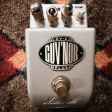Marshall GV-2 Guv'nor Plus, silver: top with the Gain knob, the Deep and Mid rings, the Treble knob, the bare Bass and Volume shafts, the badge and the footswitch