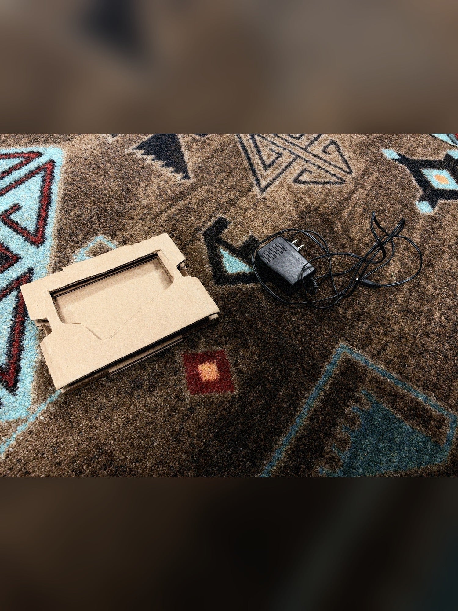 Moog Mother-32, black: the power supply and the cardboard packing insert