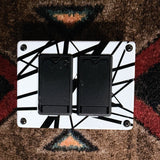 MXR EVH117 Flanger, white with black stripes: bottom plate with the two battery doors, one scuffed along its edge