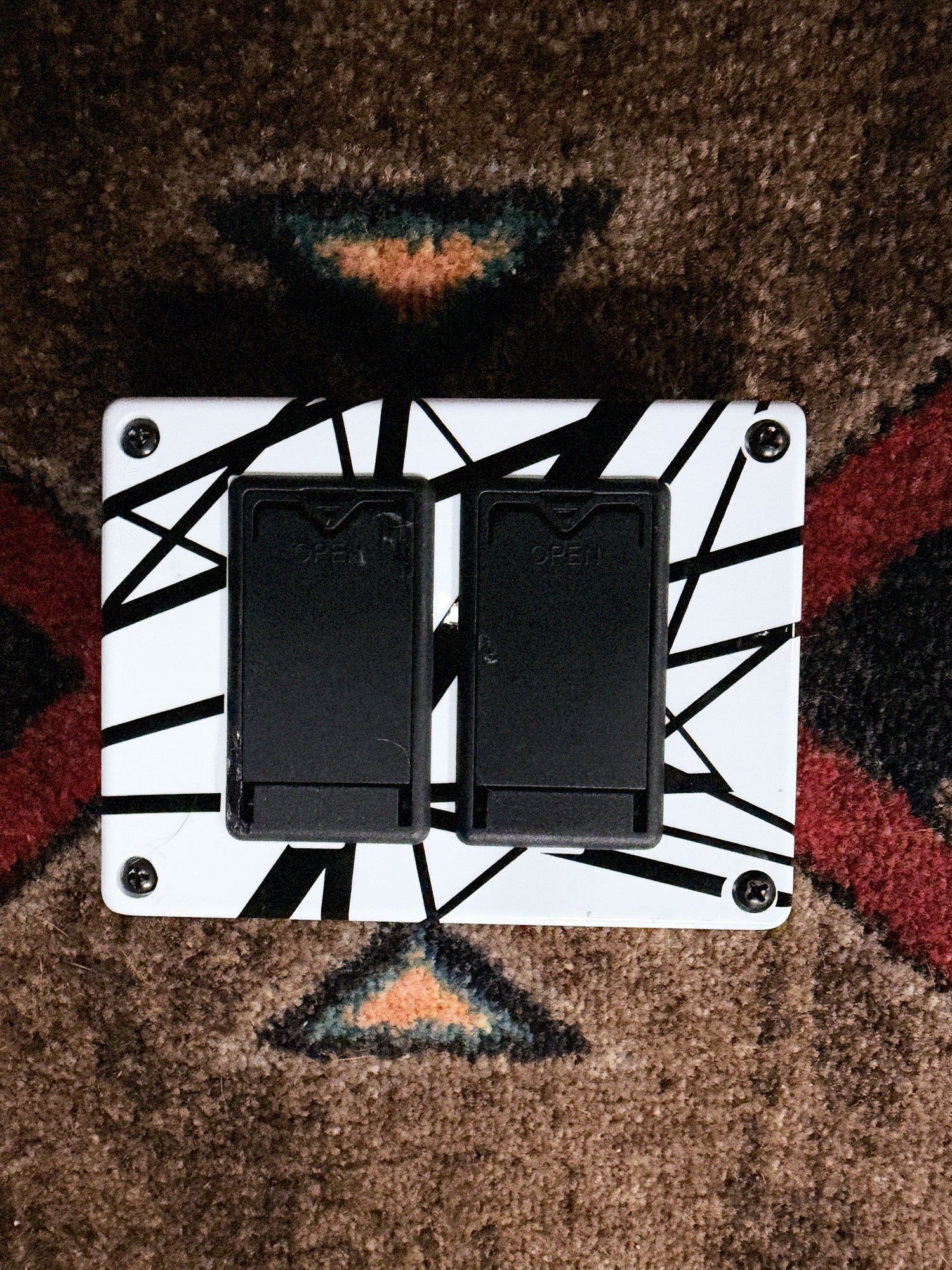 MXR EVH117 Flanger, white with black stripes: bottom plate with the two battery doors, one scuffed along its edge
