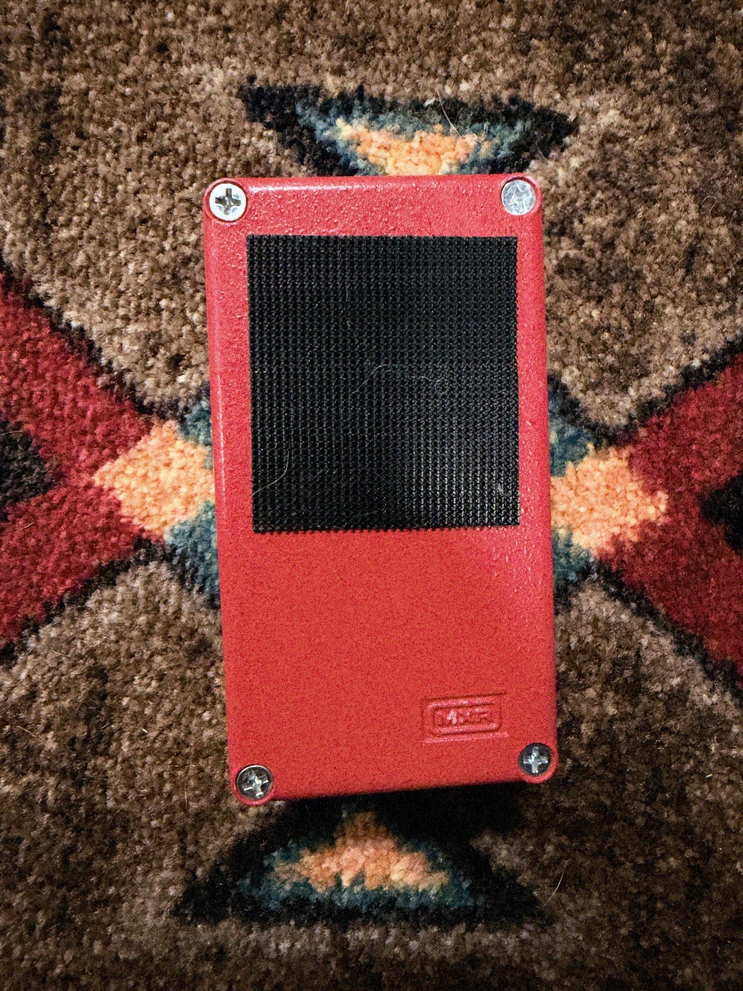 MXR M102 Dyna Comp, red: bottom plate with four screws and the embossed MXR logo