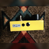 MXR M104 Distortion+, yellow: right side with the input jack, the power jack and the 9 volt label