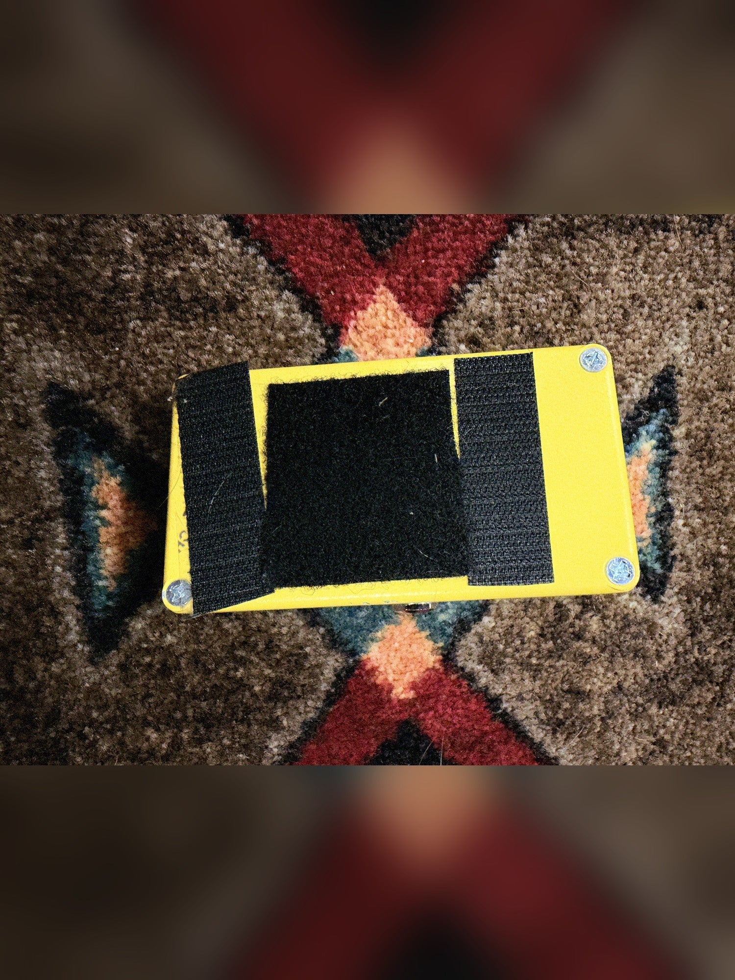 MXR M104 Distortion+, yellow: bottom plate with four screws and small chips along one edge
