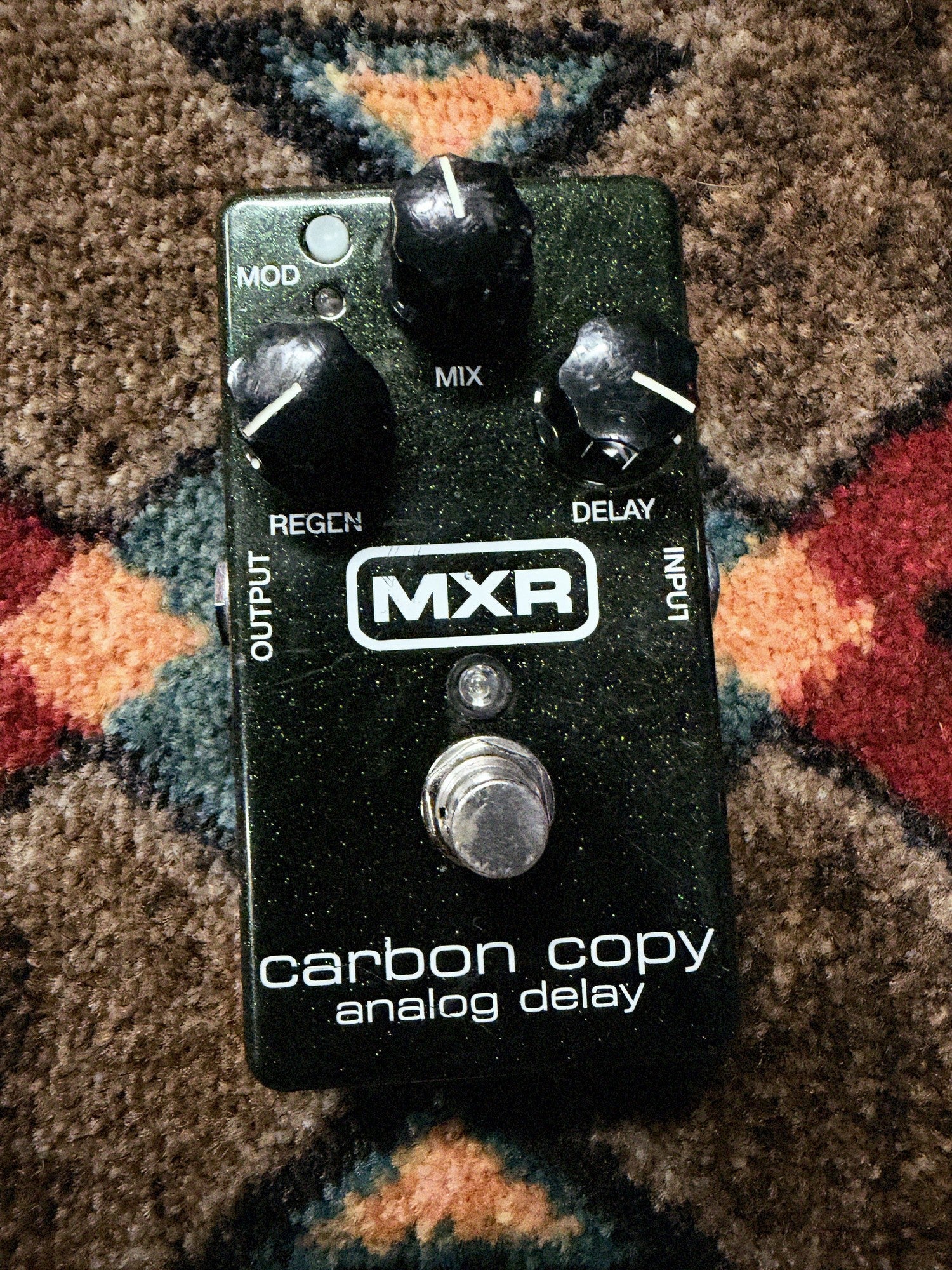 MXR M169 Carbon Copy Analog Delay, dark green sparkle: top with the Mix, Regen and Delay knobs, the Mod button, the footswitch and light scratches by the MXR logo