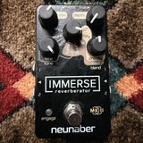 Neunaber Immerse Reverberator Mk II, black: top with the Mix, Depth and effect knobs, the Time/Tone and Pre-dly/Mod/Blend knobs, the Mk II badge, the footswitch and fine scratches above the Immerse logo