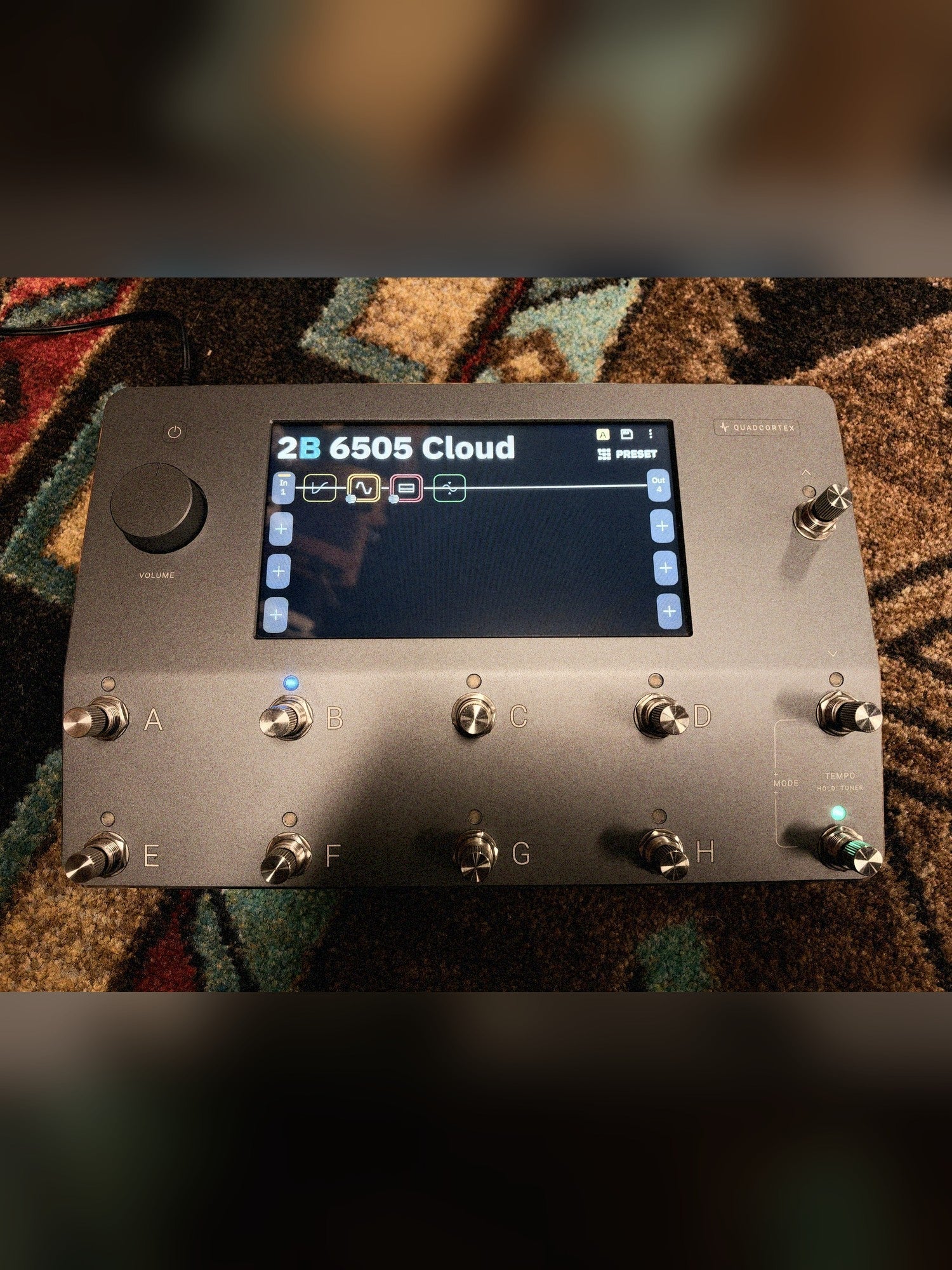 Neural DSP Quad Cortex, gray: powered on with a preset showing on the touchscreen