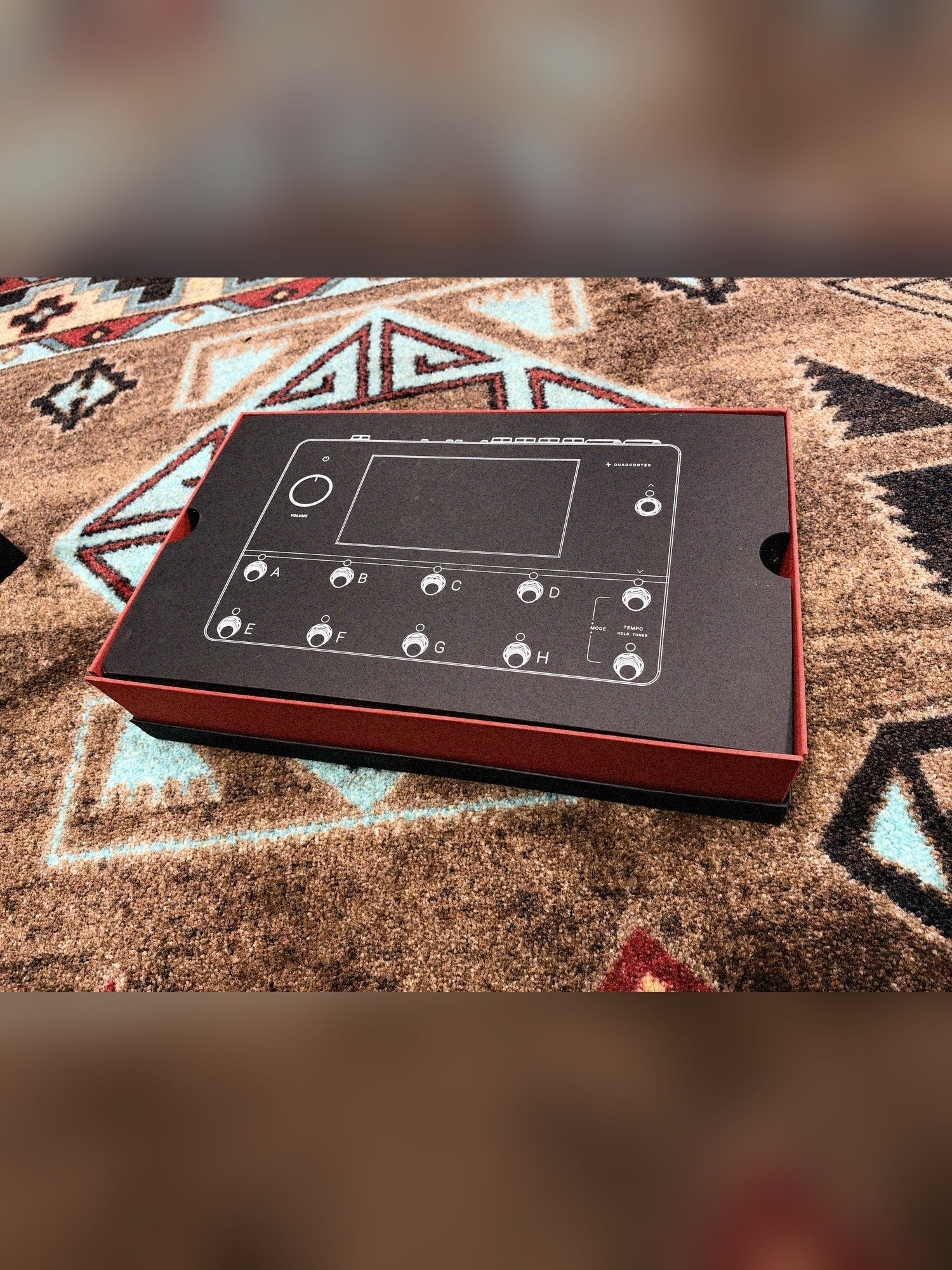 Neural DSP Quad Cortex, gray: open box with the printed insert showing the footswitch layout