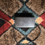 Porter Classic humbucker, neck, black cover: front of the cover with no pole holes, with its lead
