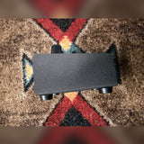 Pro Co RAT 2, black: left side of the slanted enclosure, knob end at the left