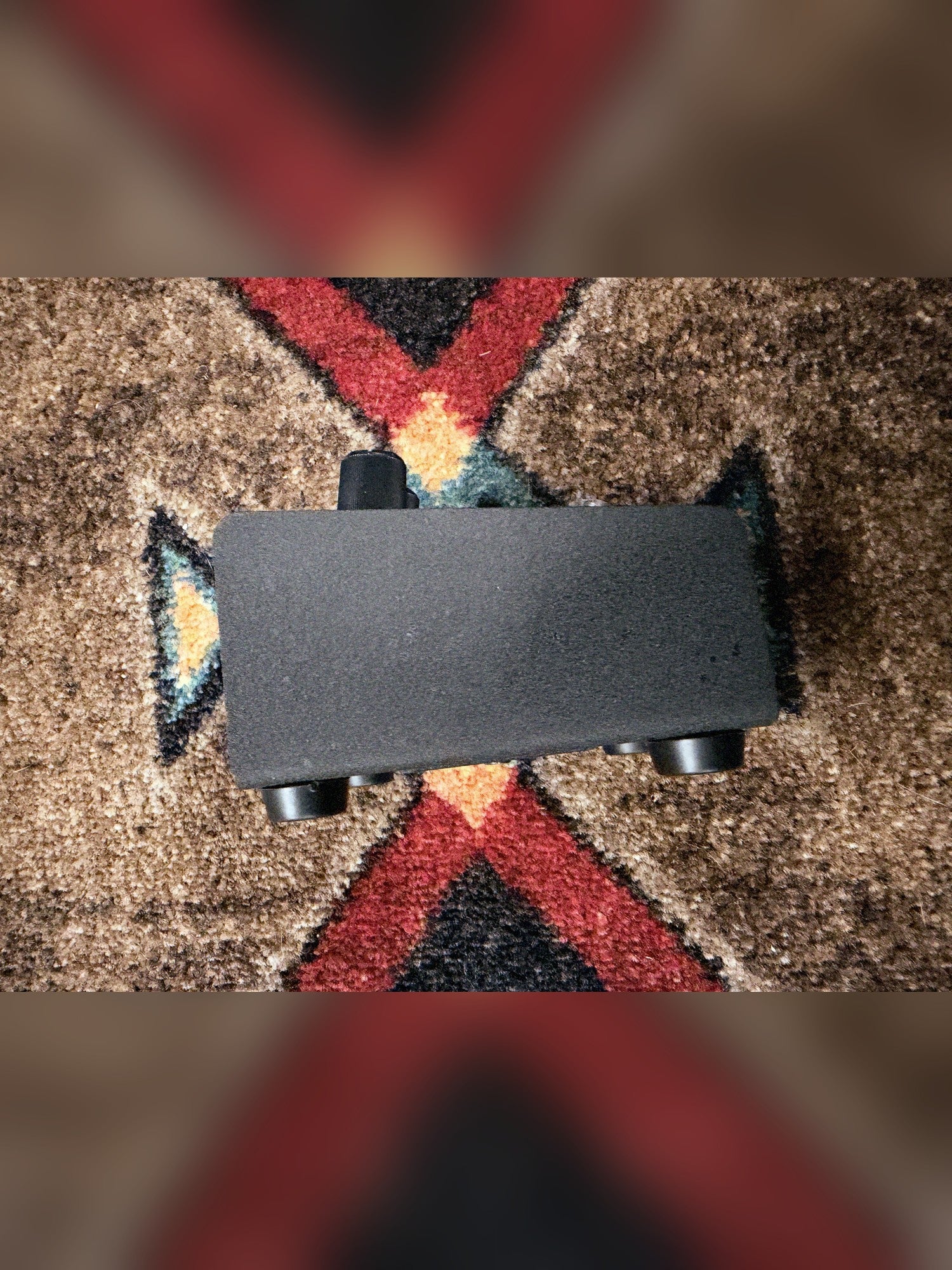 Pro Co RAT 2, black: left side of the slanted enclosure, knob end at the left