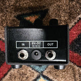 Pro Co RAT 2, black: back end with the In and Out jacks and the 9V-DC power jack