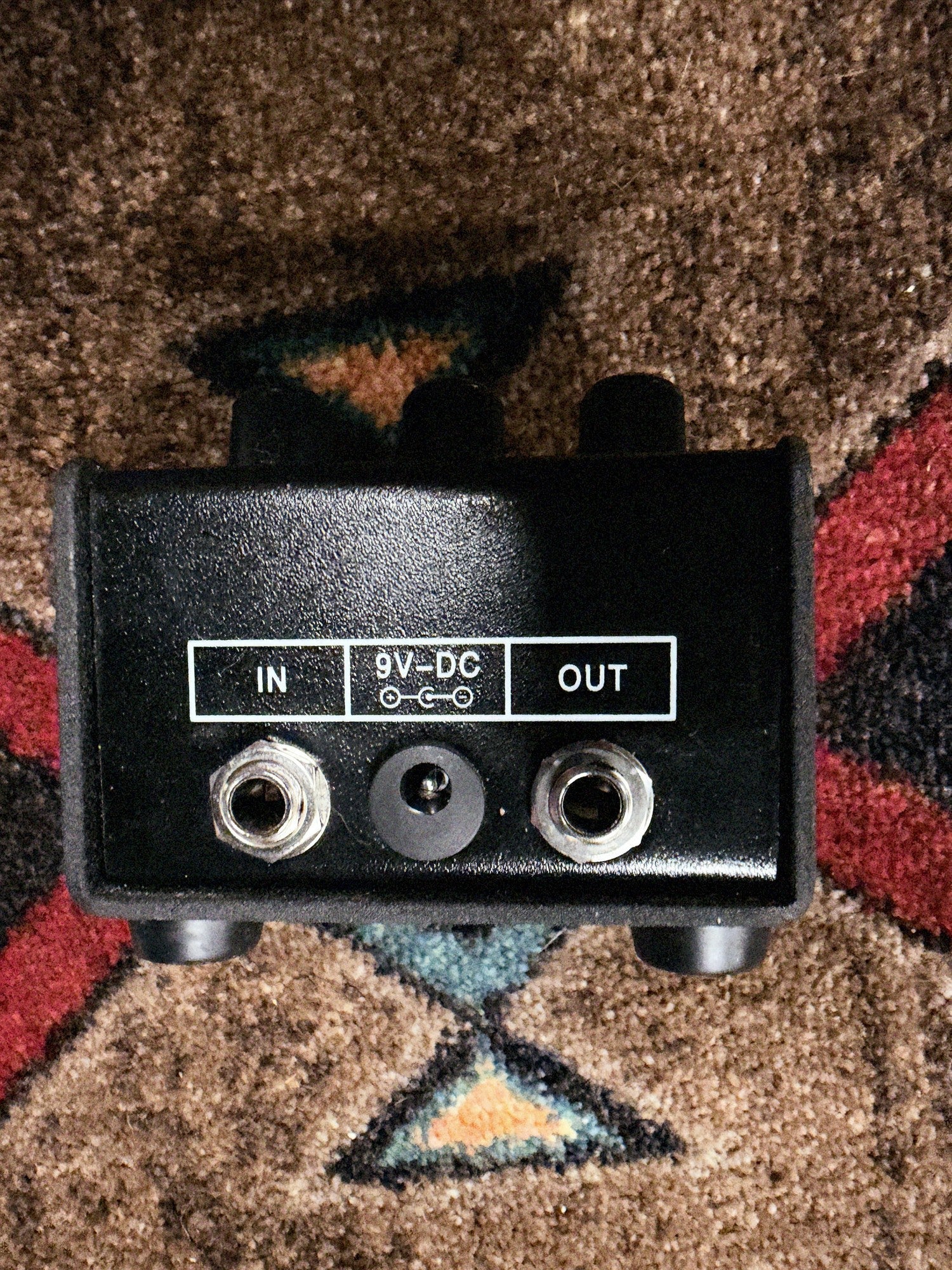 Pro Co RAT 2, black: back end with the In and Out jacks and the 9V-DC power jack