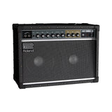 Roland JC-40 Jazz Chorus combo amp from the left front angle, black vinyl cabinet with corner protectors