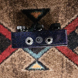 RYRA The Klone, dark blue sparkle: top edge with two 1/4 inch jacks and the power jack between them