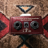 Seymour Duncan Pickup Booster, dark red: jack end with the two quarter-inch jacks, the 9 to 18 volt power jack and the Res Peak note
