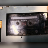 Tascam Portastudio 414 MKII, blue: cassette bay with a Sony tape loaded