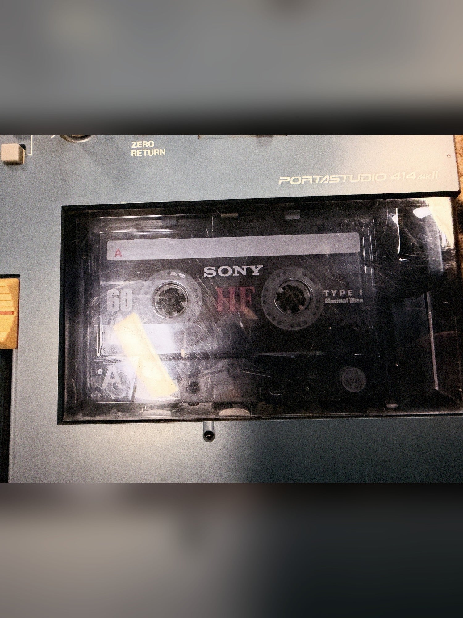 Tascam Portastudio 414 MKII, blue: cassette bay with a Sony tape loaded