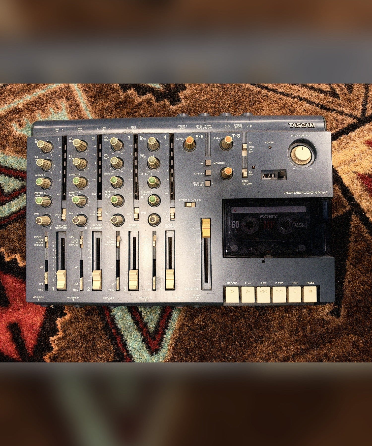 Tascam Portastudio 414 MKII, blue: the whole deck from above, mixer and cassette transport