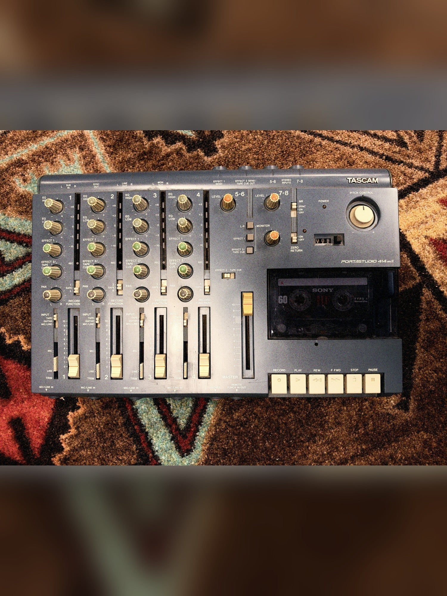Tascam Portastudio 414 MKII, blue: the whole deck from above, mixer and cassette transport