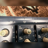 Tascam Portastudio 414 MKII, blue: close-up of the high and low EQ knobs on channels 1 and 2