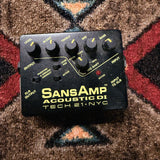 Tech 21 SansAmp Acoustic DI, black: top with the Level, Blend, Treble, Mid, Bass and Mid Shift knobs, the Pad, Phantom and Active switches and the Active LED