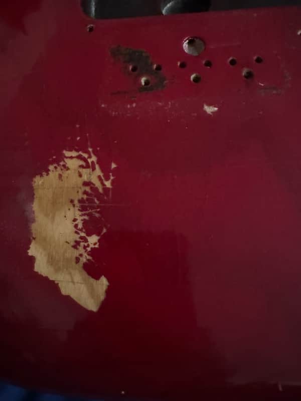 Late 70s Fender Lead Body Red - front finish wear close-up - Pauls Guitar Hideout